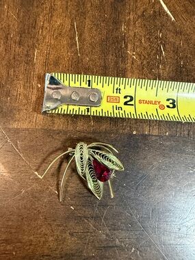 Gold-Tone Filigree Brooch pin with Teardrop Red Stone in good used condition